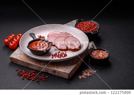 Smoked sausage or ham, cut into slices 122275800