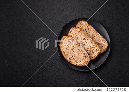 Brown bread with seeds and grains for sandwiches 122275828
