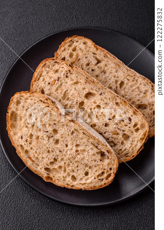 Brown bread with seeds and grains for sandwiches 122275832