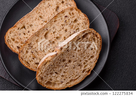 Brown bread with seeds and grains for sandwiches 122275834