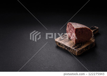 Homemade headcheese with salt, spices, herbs and vegetables Homemade headcheese with salt, spices, herbs and vegetables 122275943