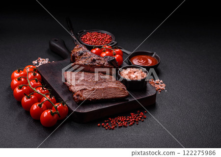 Grilled wagyu beef tomahawk steak with salt, spices and herbs 122275986