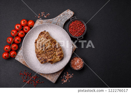 Grilled beef or pork steak with salt, spices and herbs 122276017