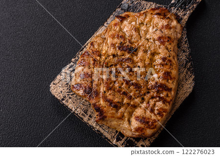 Grilled beef or pork steak with salt, spices and herbs 122276023