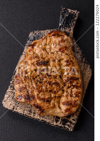 Grilled beef or pork steak with salt, spices and herbs Grilled beef or pork steak with salt, spices and herbs 122276024