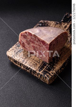 Homemade headcheese with salt, spices, herbs and vegetables 122276046