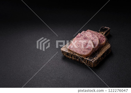 Homemade headcheese with salt, spices, herbs and vegetables 122276047