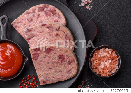 Homemade headcheese with salt, spices, herbs and vegetables Homemade headcheese with salt, spices, herbs and vegetables 122276065