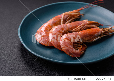Boiled tiger prawns with salt, spices, herbs and vegetables 122276084