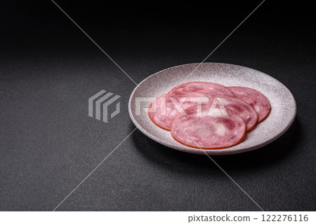 Ham cut into slices with salt and spices Ham cut into slices with salt and spices 122276116
