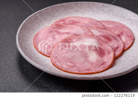Ham cut into slices with salt and spices 122276119