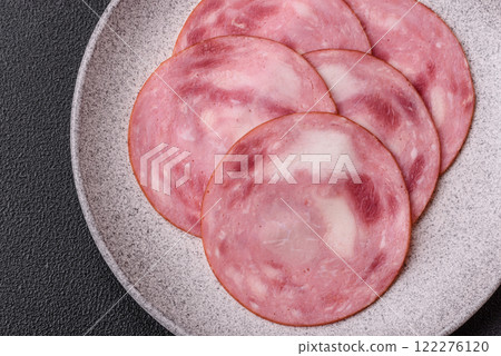 Ham cut into slices with salt and spices 122276120