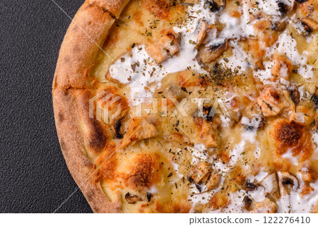 Creamy pizza with truffle cheese, mozzarella, chicken and mushrooms 122276410