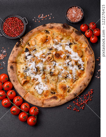 Creamy pizza with truffle cheese, mozzarella, chicken and mushrooms Creamy pizza with truffle cheese, mozzarella, chicken and mushrooms 122276415