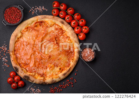 Pizza margherita with cheese, tomatoes, salt, spices and herbs 122276424