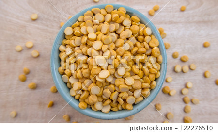 Flat Lay of Split Chickpeas (Chana Dal) Lentils in a Blue Bowl Flat Lay of Split Chickpeas (Chana Dal) Lentils in a Blue Bowl 122276510