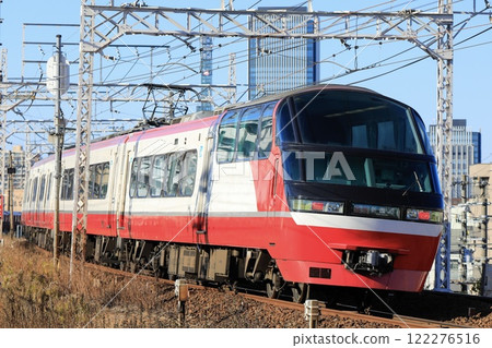 Meitetsu 1200 Series Panorama Super, running with Nagoya's buildings in the background Meitetsu 1200 Series Panorama Super, running with Nagoya's buildings in the background 122276516