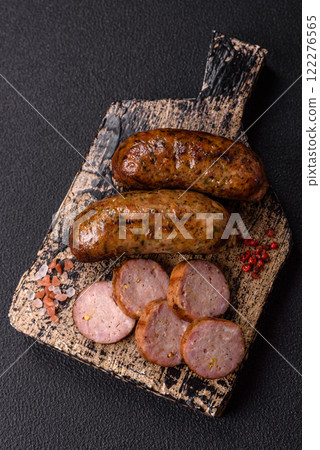 Juicy sausages with salt, spices and herbs 122276565