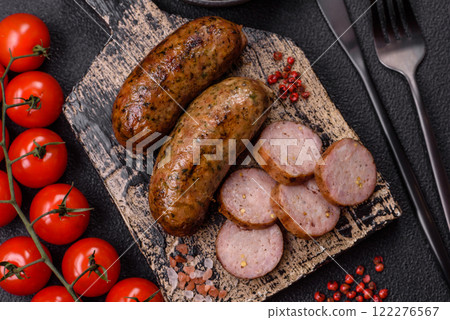 Juicy sausages with salt, spices and herbs 122276567