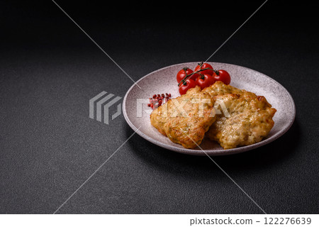 Delicious fried pork or chicken chops with salt and spices Delicious fried pork or chicken chops with salt and spices 122276639