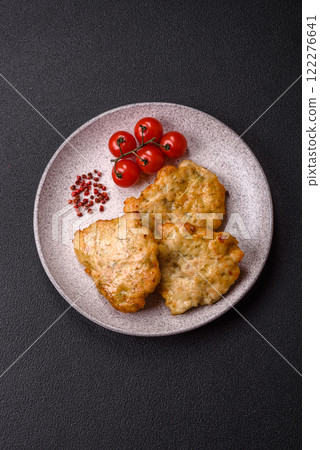 Delicious fried pork or chicken chops with salt and spices Delicious fried pork or chicken chops with salt and spices 122276641