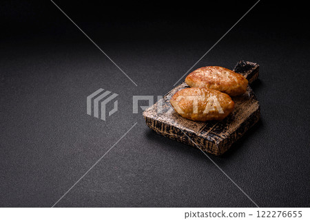 Delicious fresh fried minced fish cutlets with spices and herbs 122276655