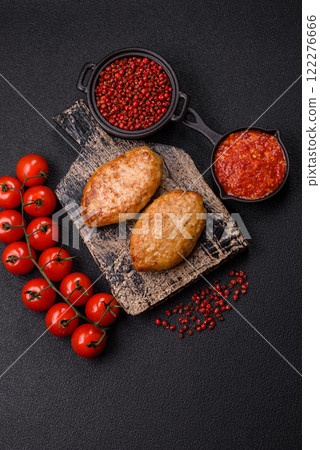 Delicious fresh fried minced fish cutlets with spices and herbs Delicious fresh fried minced fish cutlets with spices and herbs 122276666