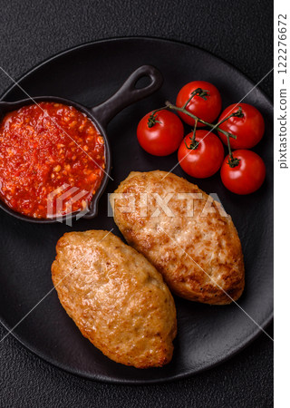 Delicious fresh fried minced fish cutlets with spices and herbs 122276672