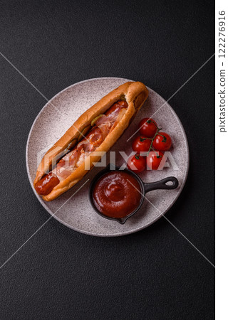 Hotdog with grilled sausage with bacon and mushrooms Hotdog with grilled sausage with bacon and mushrooms 122276916