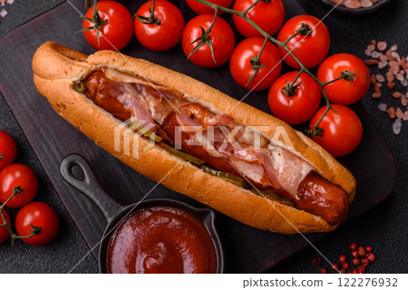 Hotdog with grilled sausage with bacon and mushrooms Hotdog with grilled sausage with bacon and mushrooms 122276932