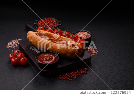 Hotdog with grilled sausage with bacon and mushrooms 122276934