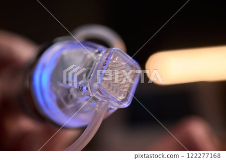 Experience an Innovative Skincare Treatment that Utilizes a High-tech Device for Best Results 122277168