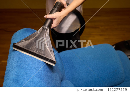 The Upholstery Cleaning Process Effectively Freshening Up a Beautiful Blue Couch The Upholstery Cleaning Process Effectively Freshening Up a Beautiful Blue Couch 122277259