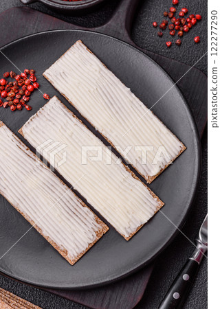 Rectangular whole grain crisp bread with cream cheese Rectangular whole grain crisp bread with cream cheese 122277290