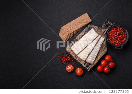 Rectangular whole grain crisp bread with cream cheese Rectangular whole grain crisp bread with cream cheese 122277295