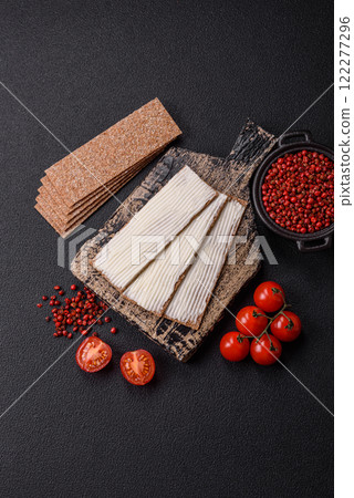 Rectangular whole grain crisp bread with cream cheese 122277296