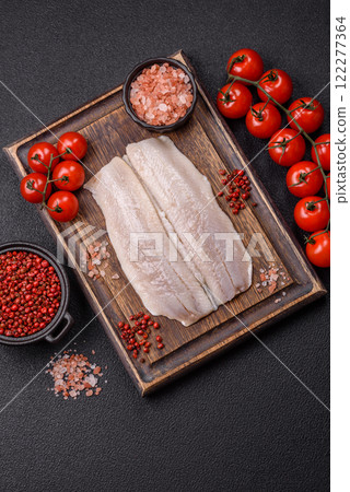 Herring fillet salted and marinated with salt, spices and oil 122277364