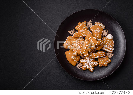 Homemade Christmas gingerbread cookies made as sweets Homemade Christmas gingerbread cookies made as sweets 122277480