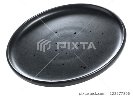 Empty black ceramic round plate at an angle on isolated background 122277896