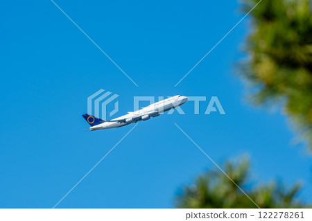 A jumbo jet taking off overseas 122278261