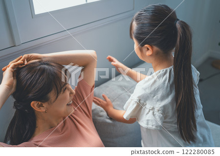 Mom and her 9 year old daughter 122280085