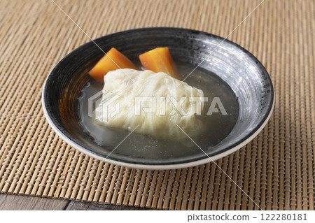 Japanese-style cabbage rolls simmered in bonito broth 122280181