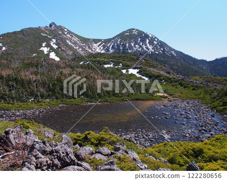 Snow still remaining on Mount Tengu in the Northern Yatsugatake Mountains 122280656