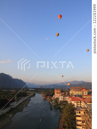 Hot air balloons over the Nam Song River, Vang Vieng, Laos. Hot air balloons over the Nam Song River, Vang Vieng, Laos. 122281999