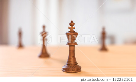 The King Wood on Table for Business concept 3d Rendering. The King Wood on Table for Business concept 3d Rendering. 122282161