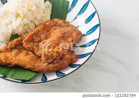 fried chicken with sticky rice 122282784