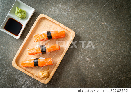 Crab Stick Sushi on wood plate Crab Stick Sushi on wood plate 122282792