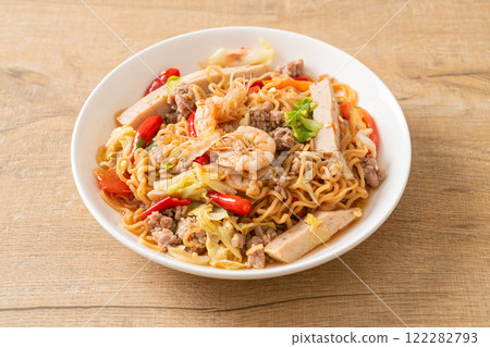Instant noodles spicy salad on plate 122282793