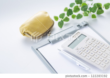 Purse, calculator and binder Purse, calculator and binder 122283192