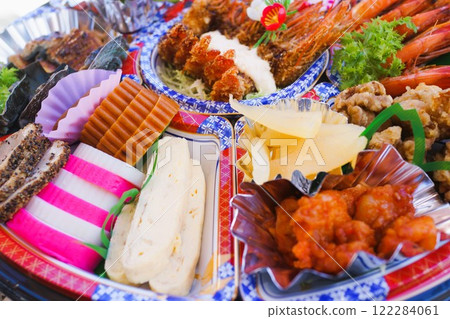 Hors d'oeuvres for New Year's dishes, material, background Hors d'oeuvres for New Year's dishes, material, background 122284061
